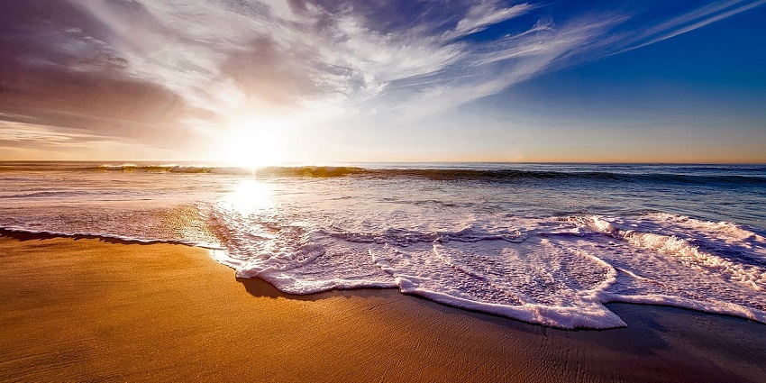 Golden sunset at Dumas Beach near Surat, one of the peaceful places to visit near Surat for 1 day.