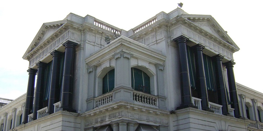 Colonial-style Fort St. George building in Chennai with tall pillars and arched windows.