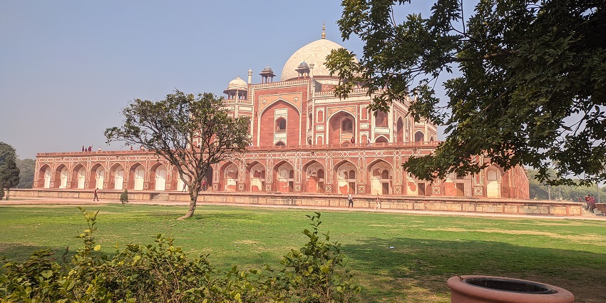 Humayun's Tomb represents Mughal architecture during the day with a clear sky, one of the best places to visit near CP.