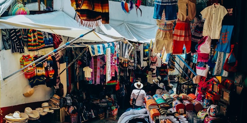 Indiranagar 100 feet road in Bangalore, with multiple shops, one of the amazing places to visit near Domlur.
