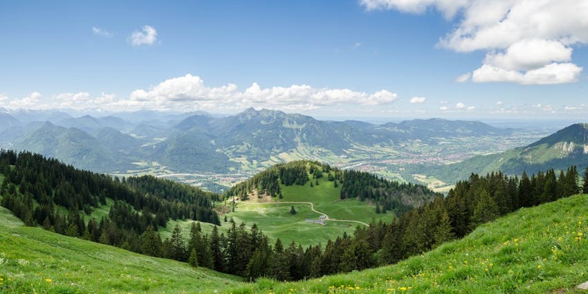 Scenic view of Janapav Kuti hills with greenery and rolling landscapes.