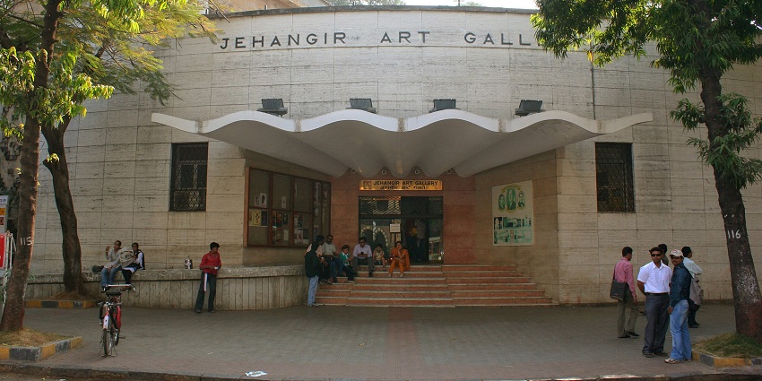 Entrance of Jehangir Art Gallery in Kala Ghoda with visitors and gallery signage