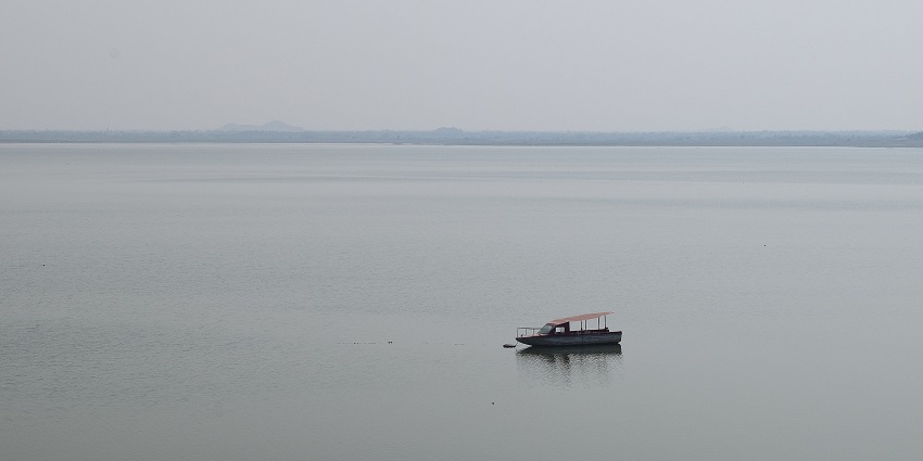 A lone motorboat sails on the vast reservoirs of Lower Manair Dam in Karimnagar near Hyderabad.
