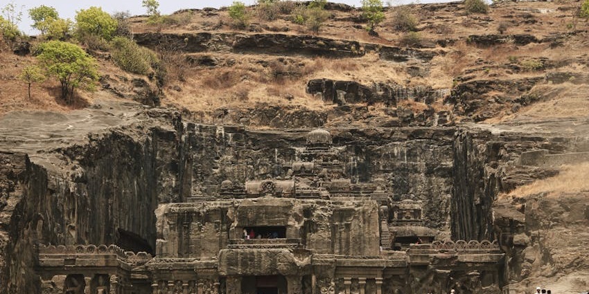 Ancient rock-cut Kondana Caves nestled in lush greenery, one of the top places to visit near Mumbai for 2 days.