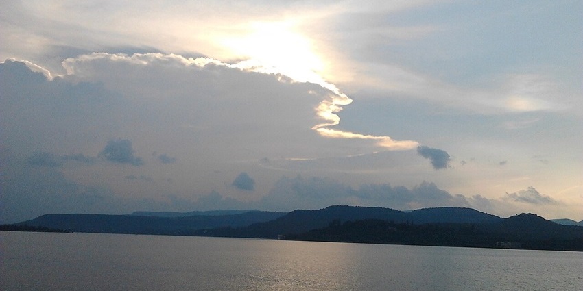 Evening view of Khadakwasla Dam reservoir, a calm spot among places to visit near Baneshwar Temple.
