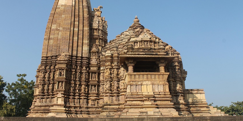 Dada Dhuniwale Temple, surrounded by trees, is a serene spiritual spot in Khandwa.
