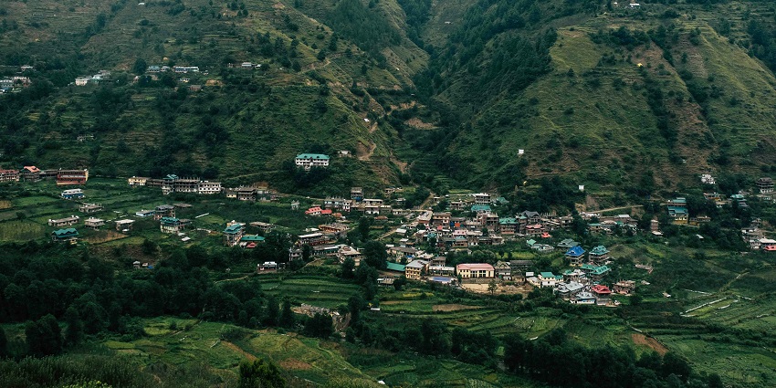 Panoramic view of Khonoma village, surrounded by green hills and mountains, one of the top places to visit near Kohima.