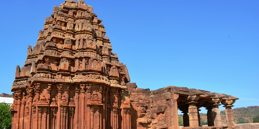 Front view of Kollur Mookambika Temple with its traditional architecture on a bright, clear day.