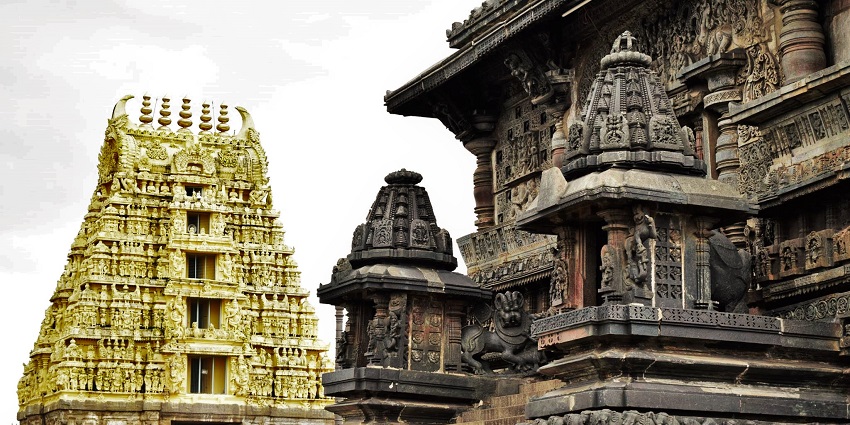 Grand Hindu temple complex with golden tower, a must-see among places to visit near Kaiwara.
