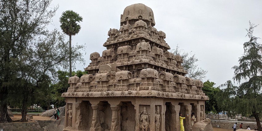 A stone-carved temple structure at The Five Rathas in Mahabalipuram, Tamil Nadu