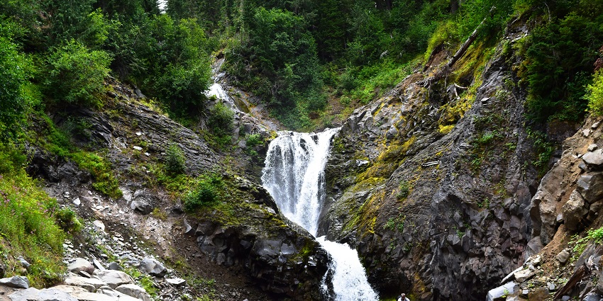 Malshej waterfall flowing through rocky cliffs, one of the serene places to visit near Mumbai for 3 days.