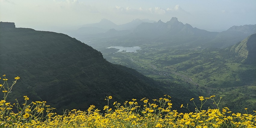 Scenic Monkey Point with lush greenery and water, perfect places to visit in November near Mumbai.