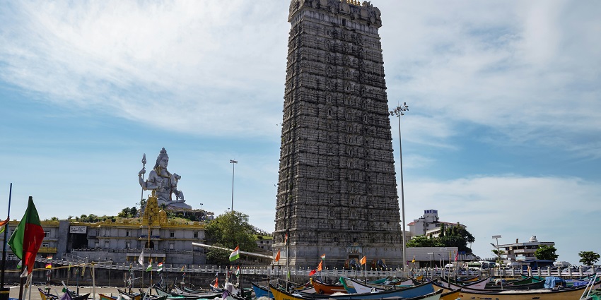 Nilkantheshwar Mahadev Temple features traditional architecture and a peaceful setting.