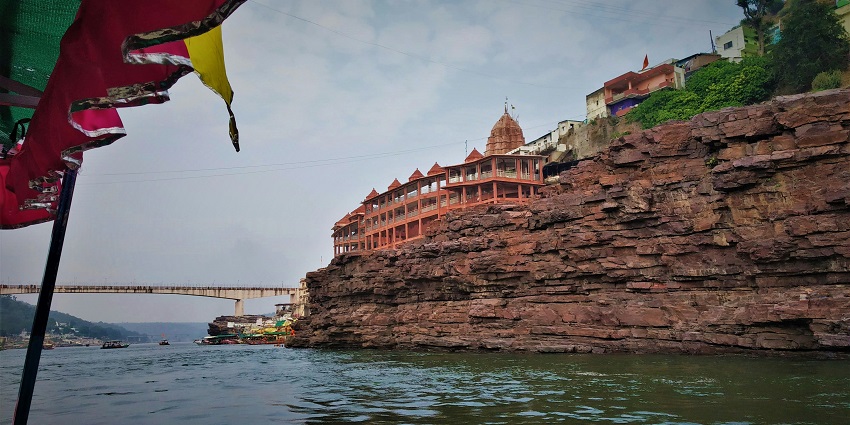 Omkareshwar Temple by the river, one of the spiritual places  to visit near Hanumantiya.

