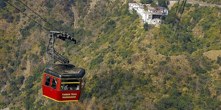 A red cable car on the Timber Trail in the hills of Parwanoo in Himachal Pradesh.