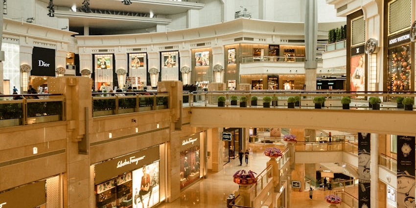 Interior view of Phoenix MarketCity Mall featuring various retail shops and displays.
