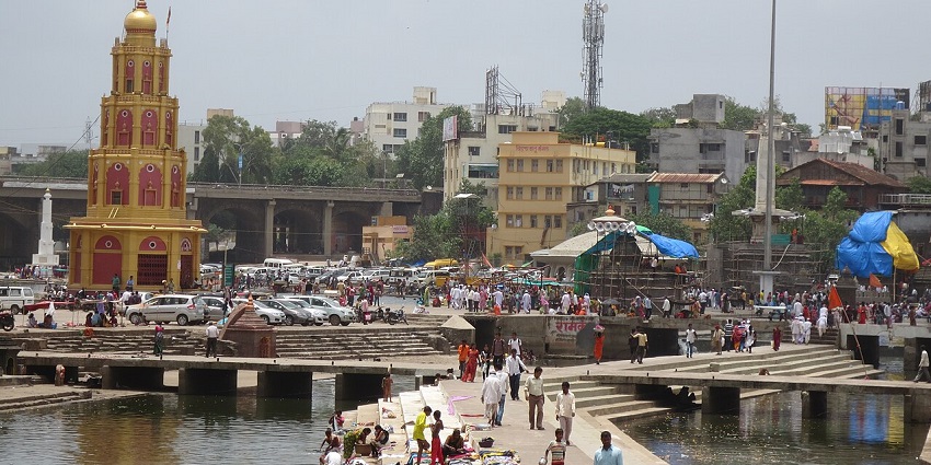 Ramkund in Nashik is a holy swash ghat on the Godavari River with crowds of people