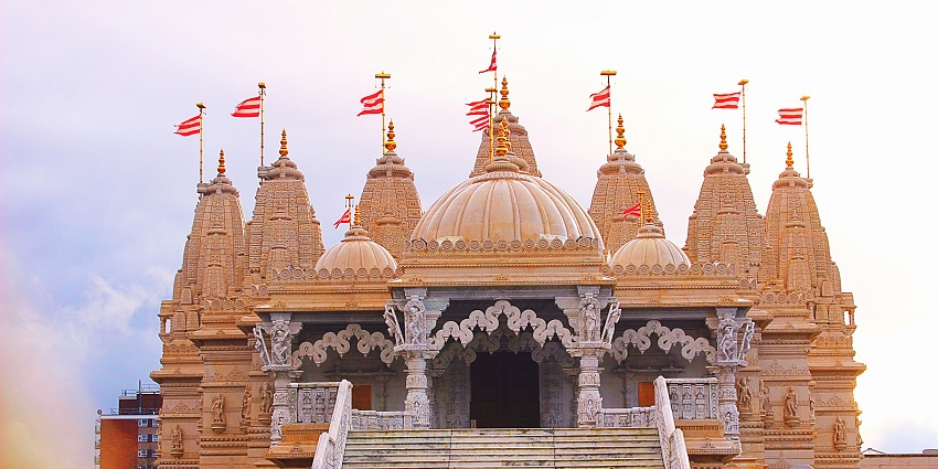 Ancient temple in Taki with traditional architecture under a clear sky.