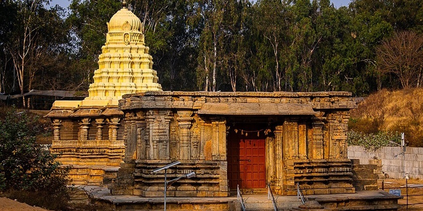 Shree Keerthinarayana Swamy Temple in Talakadu with detailed architecture and stairs leading to the entrance.