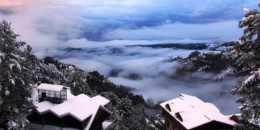 Snow-covered trees, hills and thick clouds complete the winter landscape of Theog