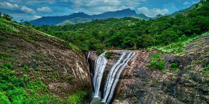 Ubbalamadugu Falls, surrounded by lush greenery, one of the amazing places to visit near Chennai in September.