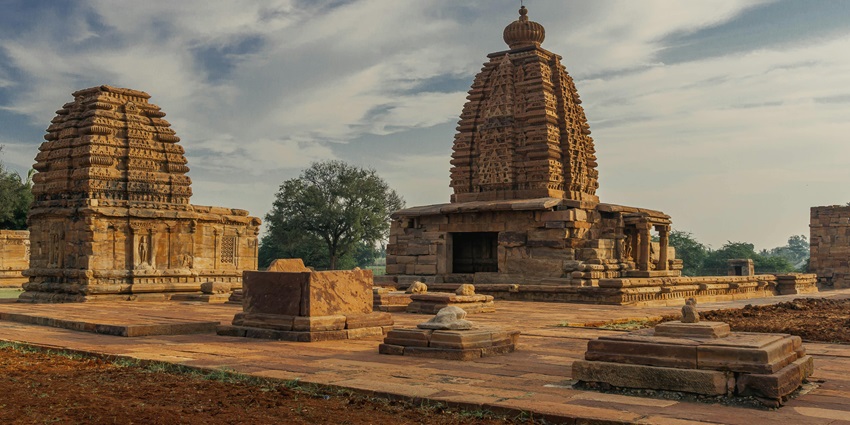 Exterior view of Udupi Sri Krishna Temple featuring traditional architecture and calm surroundings.