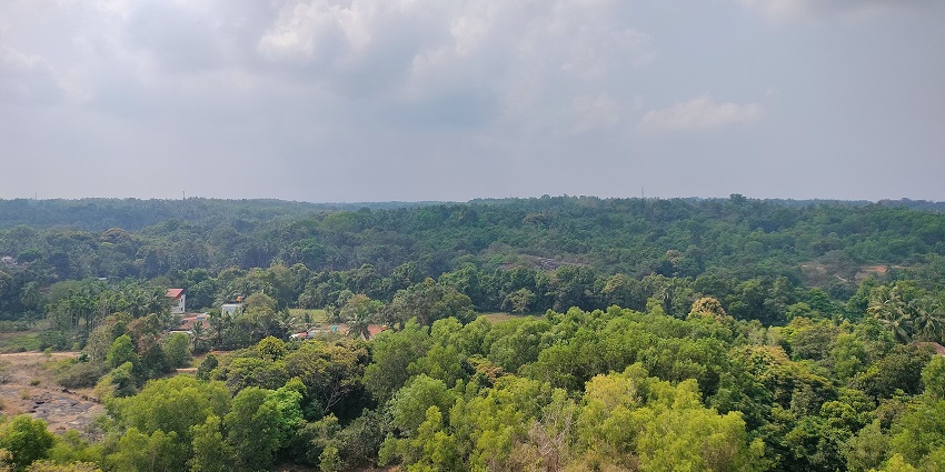 Panoramic view of the Udupi Parashurama Temple complex with red-tiled roofs and greenery around.