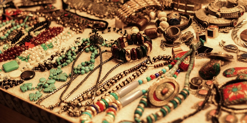 Handmade jewellery arranged neatly on display tables at ARTE, The Makers’ Market.
