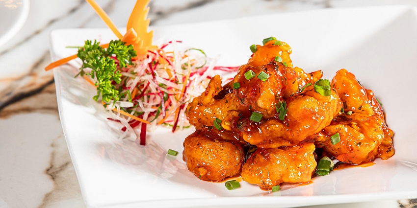 Chilli chicken served hot at Amarjeet Hotel Restaurant, a top pick among restaurants in Kurseong.
