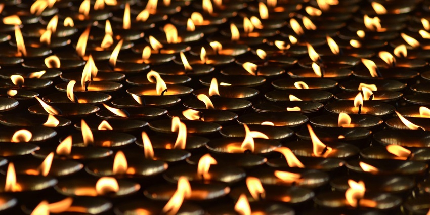Rows of glowing diyas beautifully line the ghats during Diwali in Ayodhya.