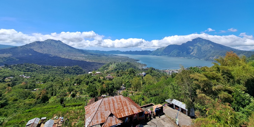 View of Lake Batur and surrounding mountains from the terrace of Batur Geopark Museum.

