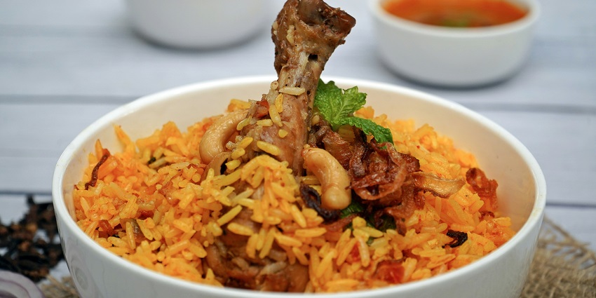 Chicken biryani served at Bawarchee Restaurant, a popular spot among restaurants in Sevoke Road Siliguri..

