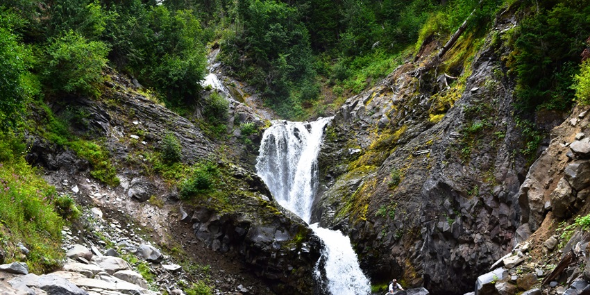 Bhatta Falls is a serene waterfall surrounded by lush greenery and forests, one of the waterfalls in Uttarakhand.