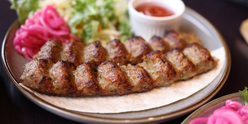 Tandoori kebab served at Bombay Brasserie with green chutney, one of the famous restaurants in Fancy Bazar Guwahati.