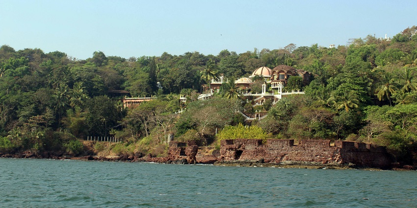 Cabo de Rama fort in Goa with old architectural buildings, broken, ruined walls and greenery, one of the offbeat places in Goa.
