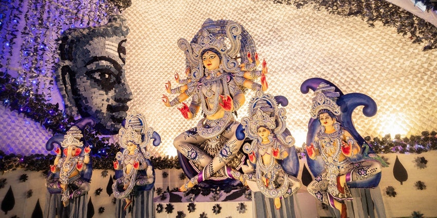 Interior view of a beautifully decorated Durga idol at College Square pandal.