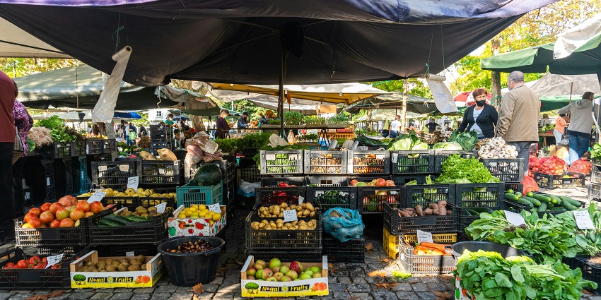 Fresh fruits and vegetables are displayed at Connemara Market, a popular spot for shopping in Kerala.

