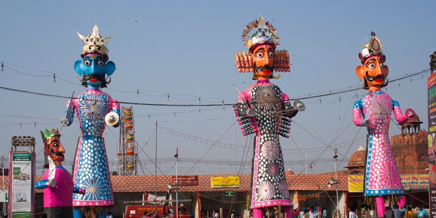 Huge effigies of Ravana, Meghnath, and Kumbhkaran during Dussehra celebrations in India.