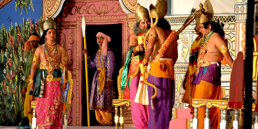 Ramleela play performance in Delhi with actors in traditional costumes during Navratri celebrations.