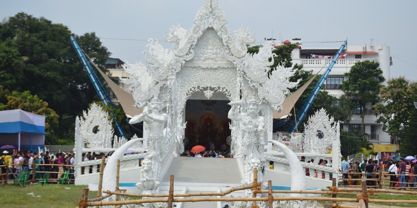 Intricately carved white Durga Puja pandal in Deshapriya Park during Durga Puja in Kolkata.