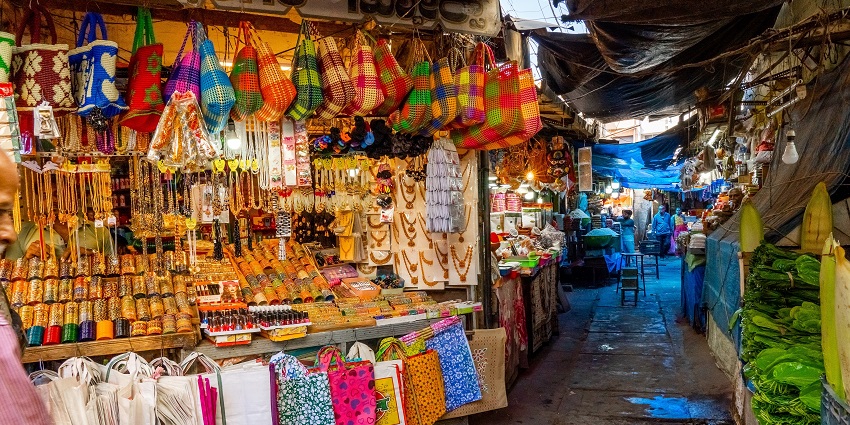 Traditional street market in Mysore with women’s jewelry, handmade bags, and vibrant local shopping.
