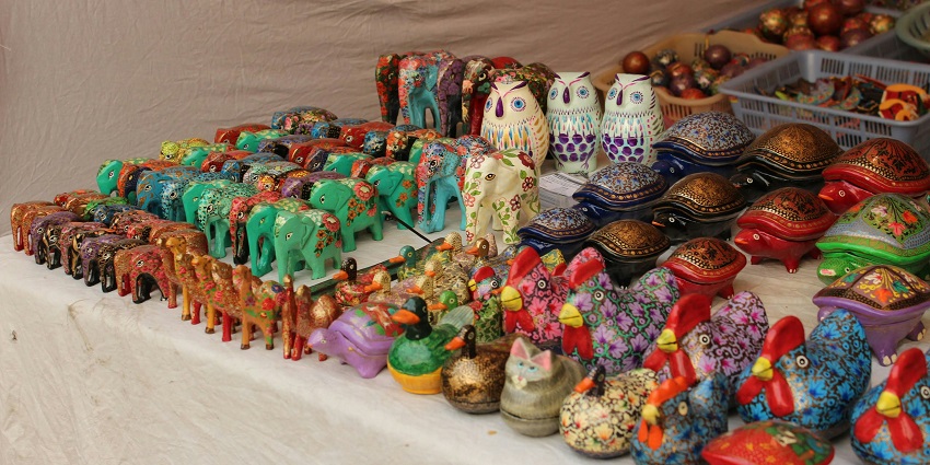 Colourful figurines are displayed at the Directorate of Handicrafts and Handloom for shopping in Sikkim.