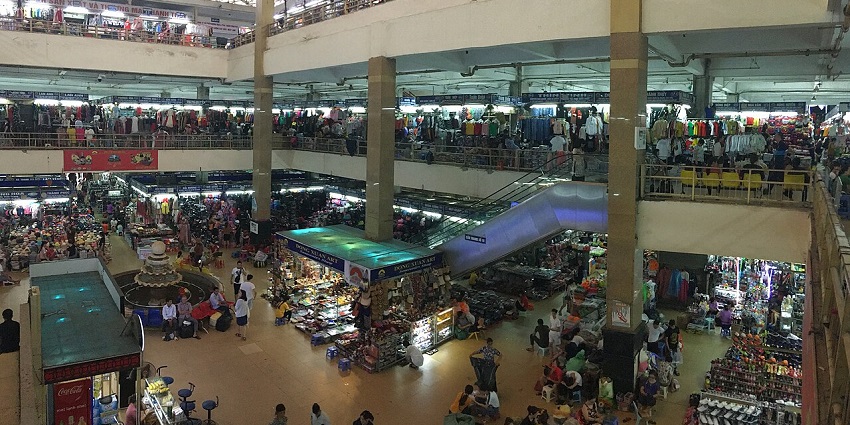 A view of shops from the first floor of Dong Xuan Market shows its crowded shoppers.
