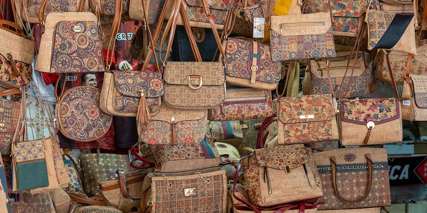 Handbags on display at the Dubai Flea Market, one of the best flea markets in Dubai.
