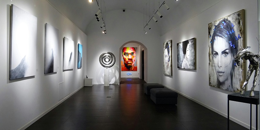 Interior view of the Gallery OED showcasing contemporary art pieces on display, one of the famous art galleries in Kerala.