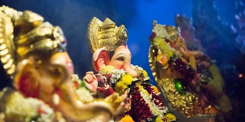 Idols of Lord Ganesh worshipped with garlands during Ganesh Chaturthi, one of the festivals in Goa.