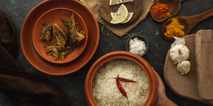 A traditional Indian thali served at Ghoomar Traditional Thali with variety of dishes.
