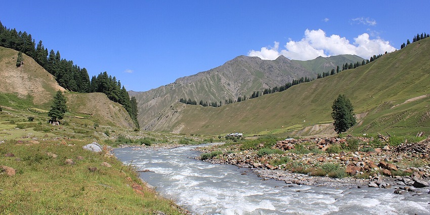The Kishenganga River flows between the tree-lined hills of the Gurez Valley, one of the best valleys in Kashmir.