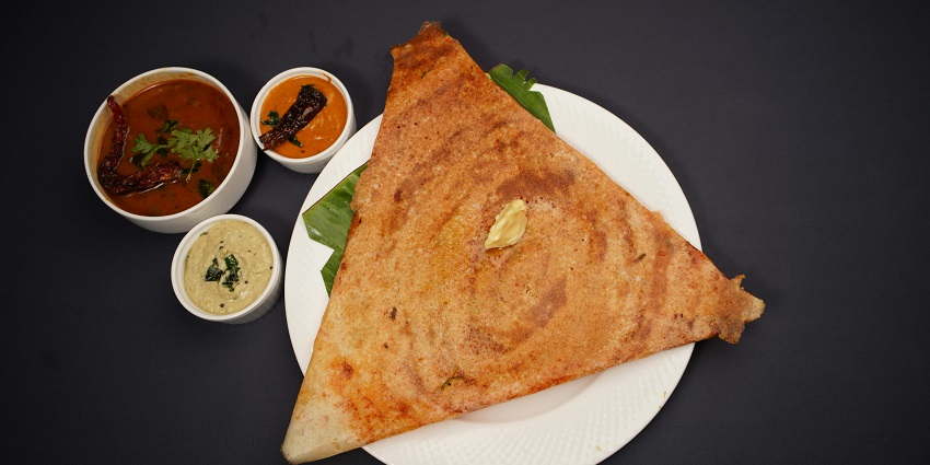 A crispy dosa served at Hasty Tasty, one of the top pure veg restaurants in Darjeeling.