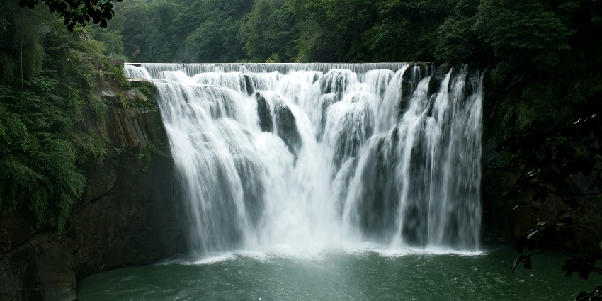 Water cascading into a pond at Hebbe Falls, one of the most beautiful waterfalls in Karnataka.
